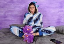 Stunning Aradia In A One-Piece Hooded Pajama And Purple Slippers