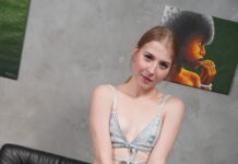 St Martha slips off her jeans and slides her fingers into her pussy in VR