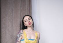 Baby Chocolate is back showing off her long legs and pretty pussy