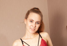 Mencia Francis spreads her legs wide and slips a dildo into her hungry pussy