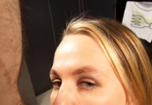 Elena Muze is in the kitchen spreading her legs open to show her pussy in VR