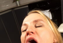 Elena Muze is in the kitchen spreading her legs open to show her pussy in VR